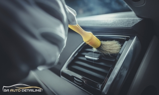 Steering Wheel being cleaned with specialized brush